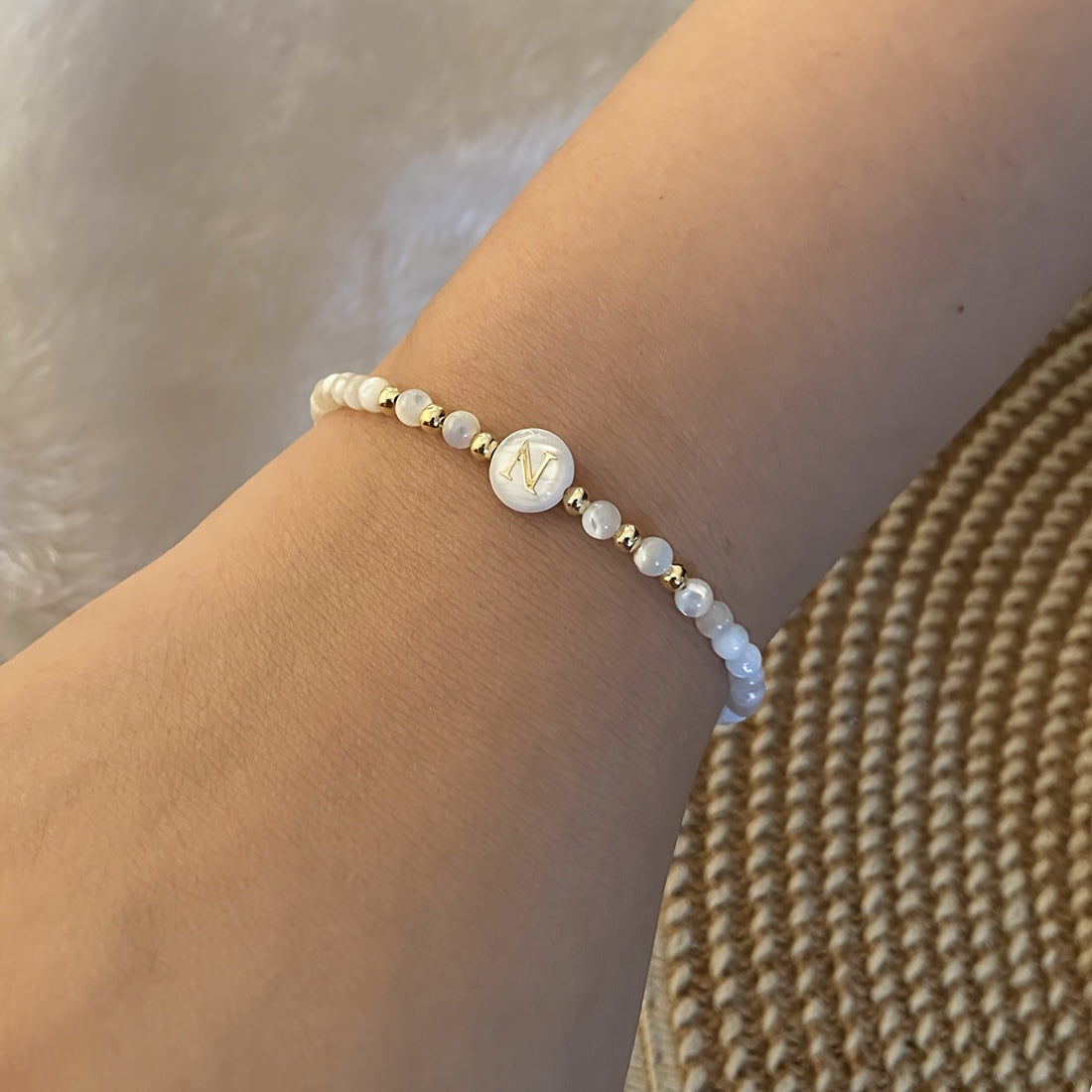 Elegant Initial Pearl Bracelet worn on the wrist