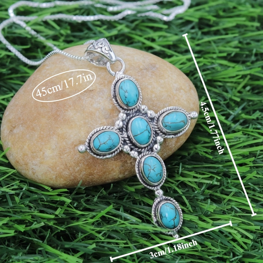 Bohemian Turquoise Cross Necklace detail on a stone