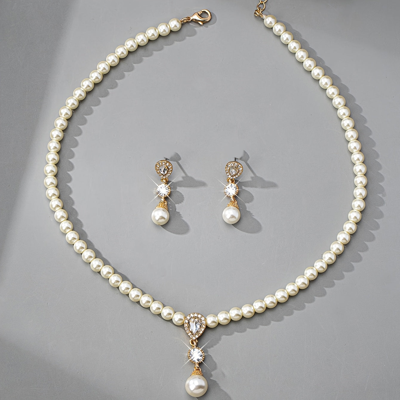 Full view of the pearl necklace and earrings