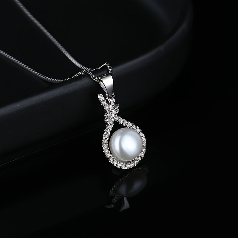 Close-up of the pearl in its twisted zirconia setting