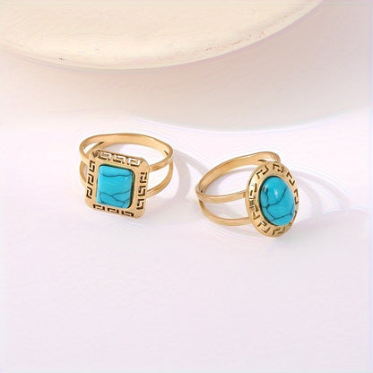 Vintage Turquoise Greek Key Rings styled on a light background
