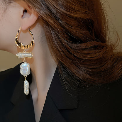 Elegant Baroque Pearl Hoop Earrings worn on the ear