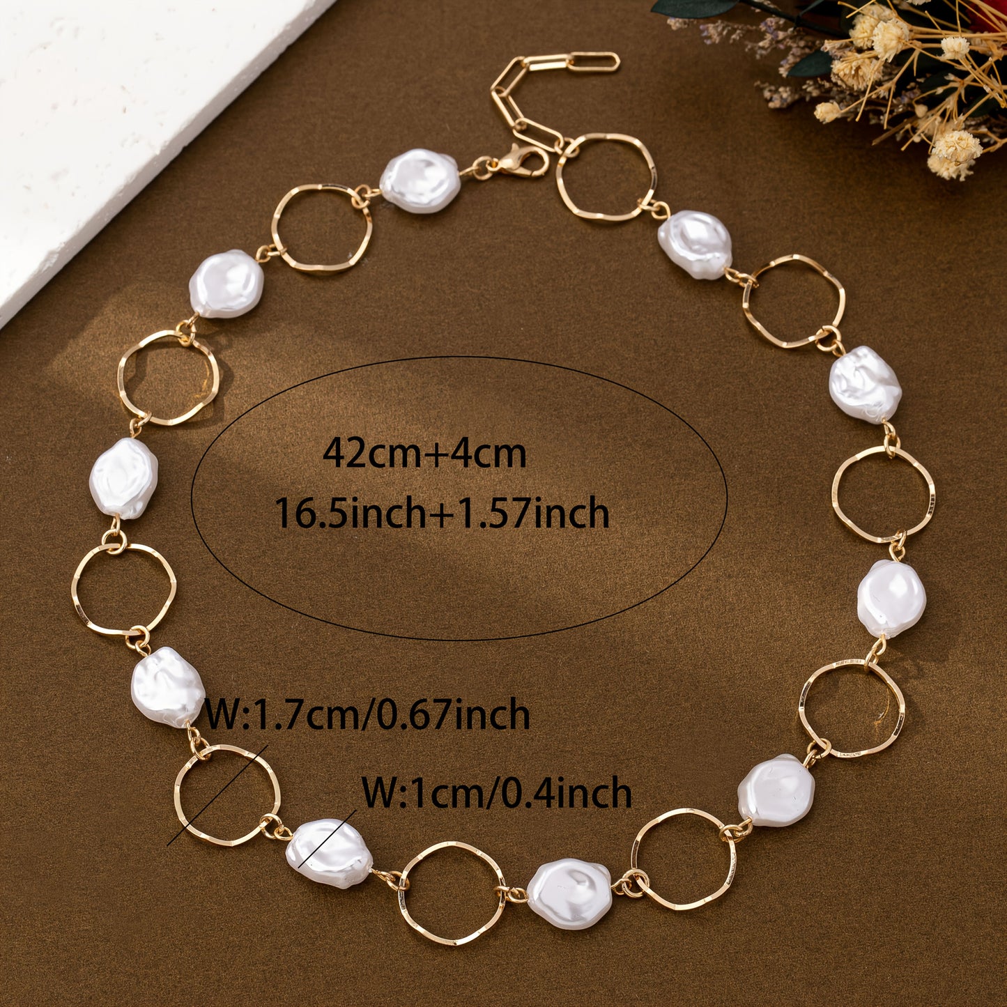 Close-up of the baroque pearls and gold links