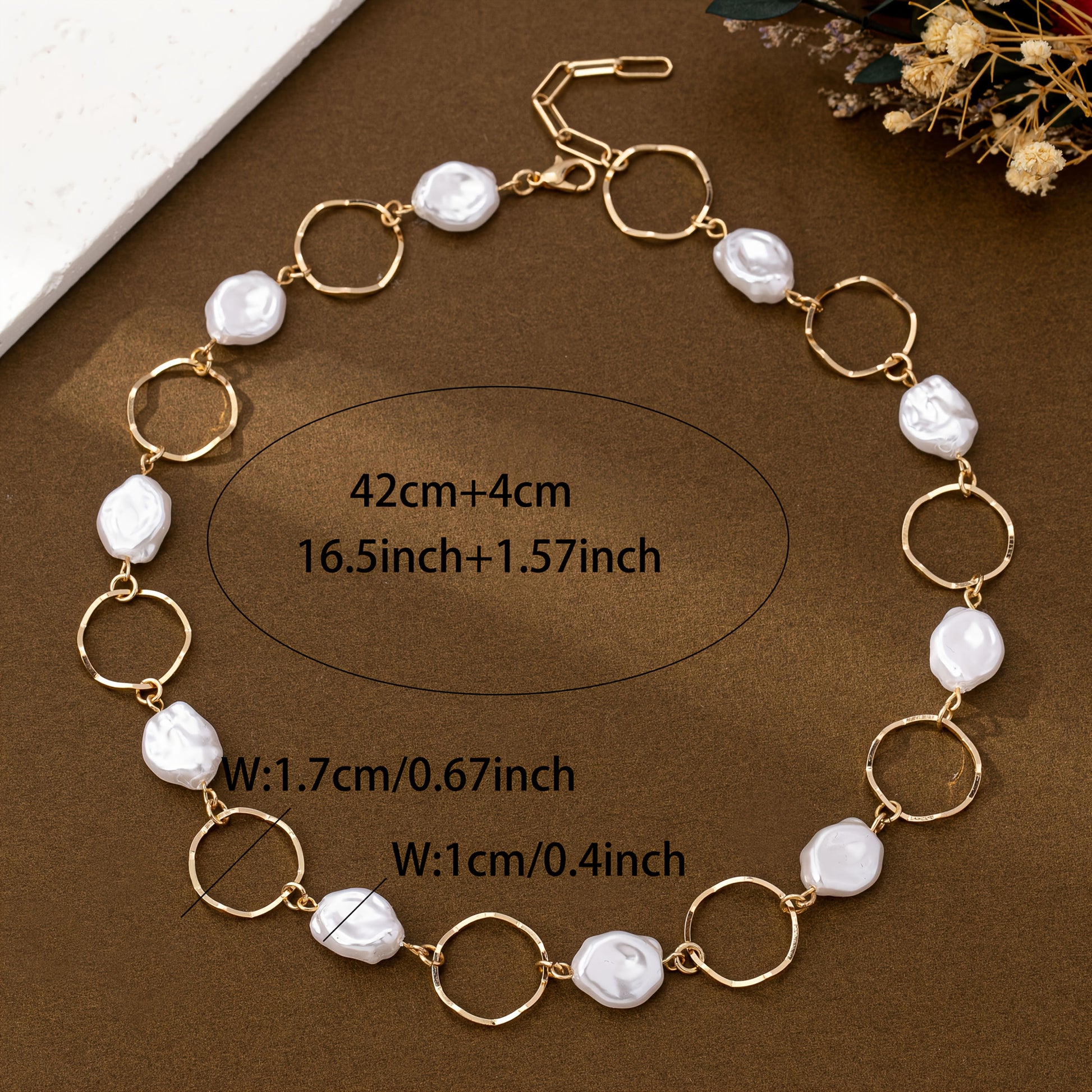 Close-up of the baroque pearls and gold links