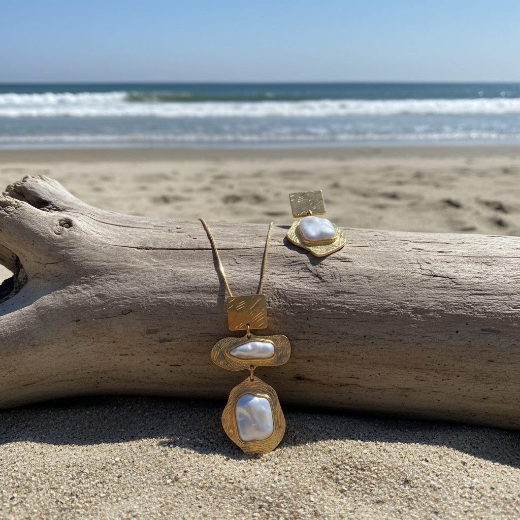 Matching pearl mosaic earrings worn on the ear
