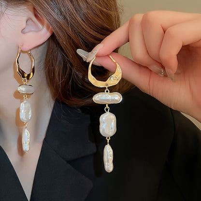 Side view of the earrings being worn