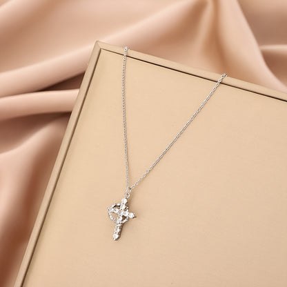 Radiant Crystal Cross Necklace lifestyle shot outdoors