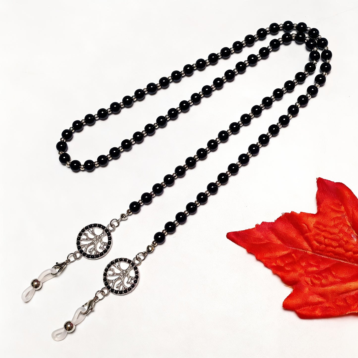 Black Silver colourway of the tree of life glasses chain