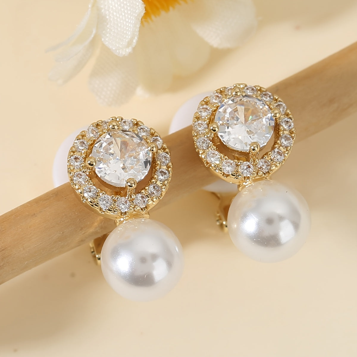 Golden colourway of the pearl halo clip earrings