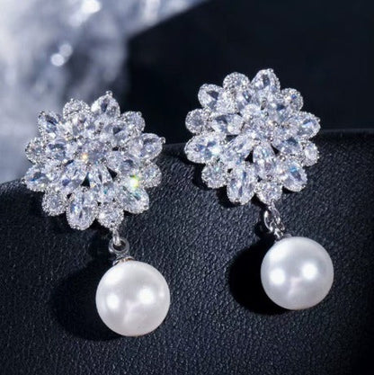 Elegant Pearl Blossom Clip Earrings