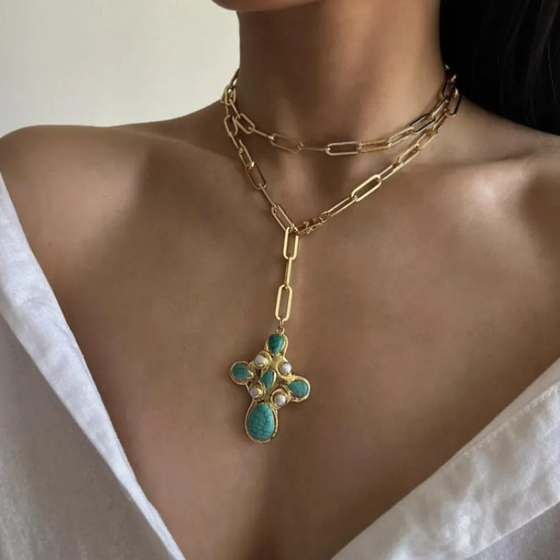 Statement Turquoise Cross Lariat Necklace worn with a white shirt