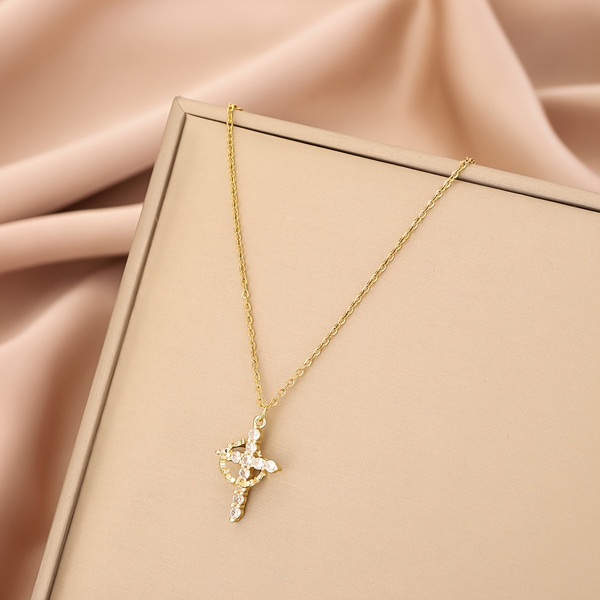 Close-up of the Radiant Crystal Cross Necklace pendant