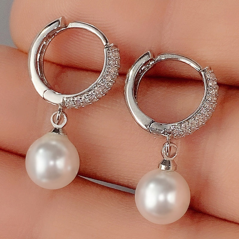Refined Pearl Drop Hoop Earrings styled