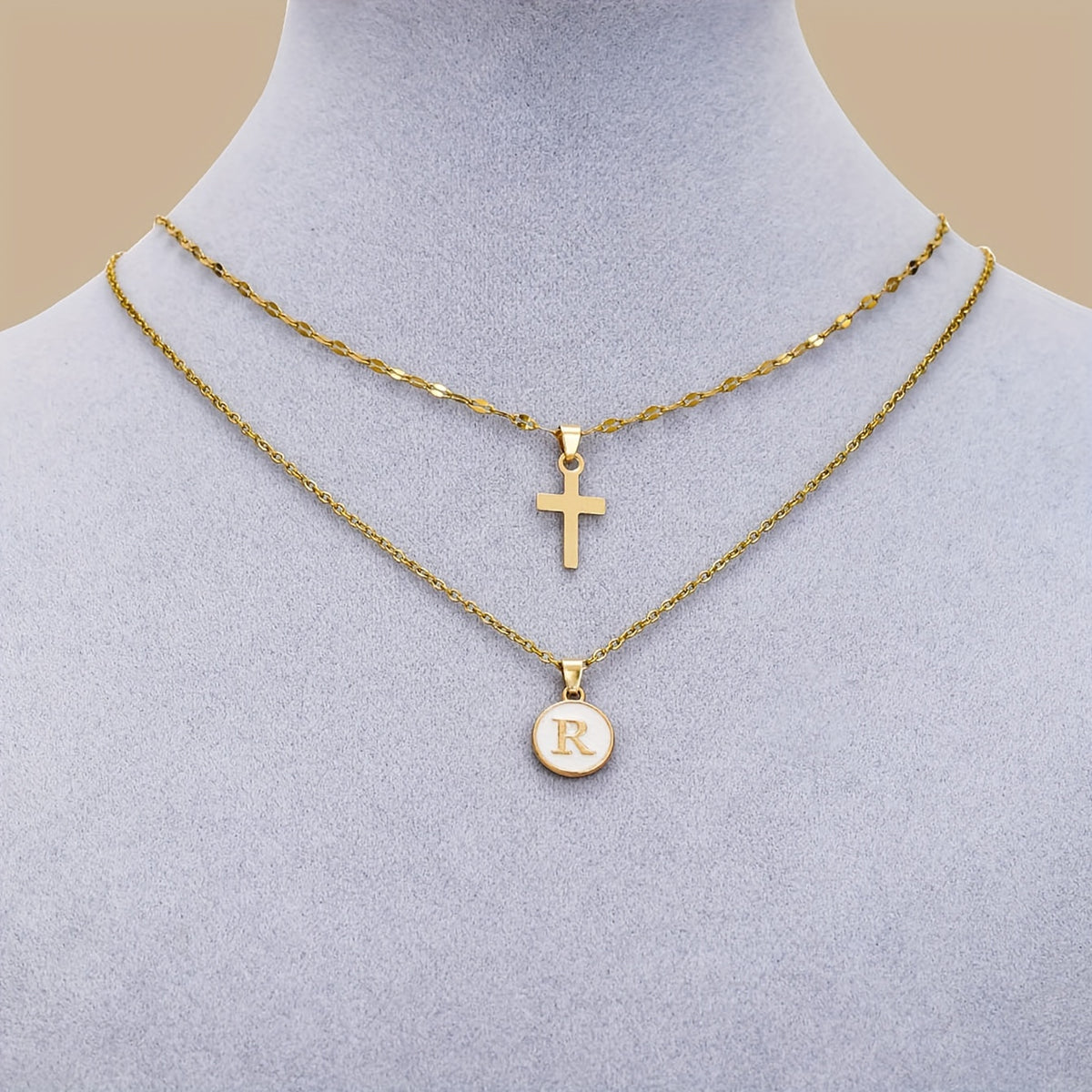 Timeless Cross & Initial Necklace Set worn on the neckline
