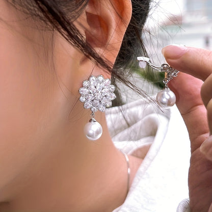 Romantic Pearl Blossom Clip Earrings worn on the ear