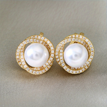 Classic Pearl Halo Clip Earrings worn on the ear