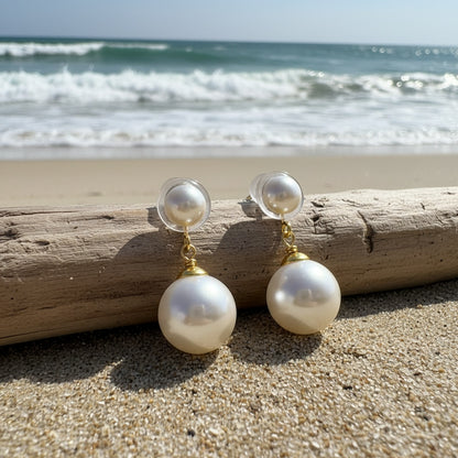 Vintage Round Pearl Clip Earrings styled at the beach