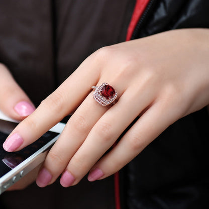 **Sophisticated Ruby Halo Gold Ring**